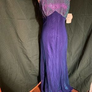 Stepping out size 9/10 purple blue gown. New with tags
